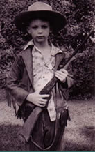 young dale 1950 with bbgun and cowboy hat